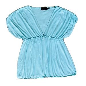 the limited woman tops xs Baby Blue Ruffle Blouse